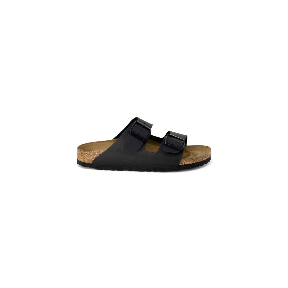 Black sandal with cork sole on a white background