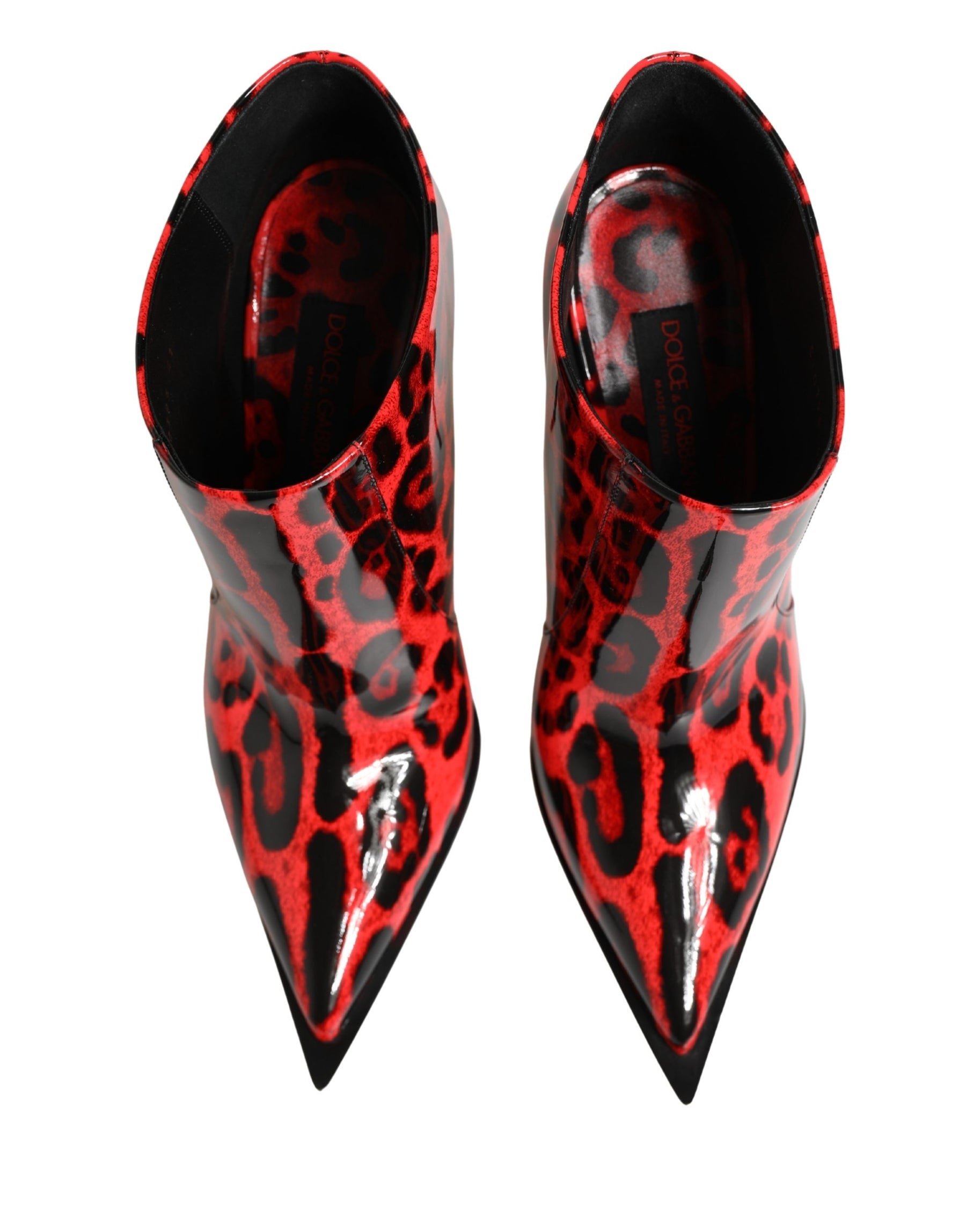 Red and black leopard print pointed-toe shoes on a white background