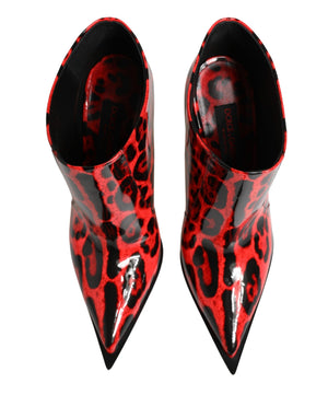 Red and black leopard print pointed-toe shoes on a white background