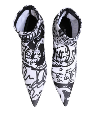 Black and white pointed-toe shoes with artistic designs on a white background