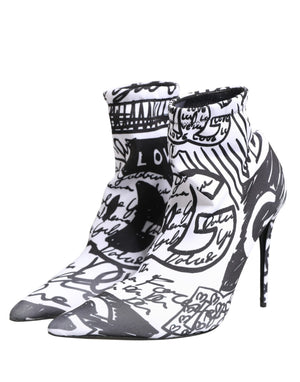 Black and white high-heeled shoes with artistic design on a white background