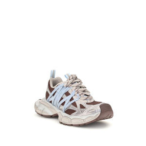 Balenciaga multicolor polyurethane athletic sneaker with brown mesh, light blue laces, and chunky white rubber sole.