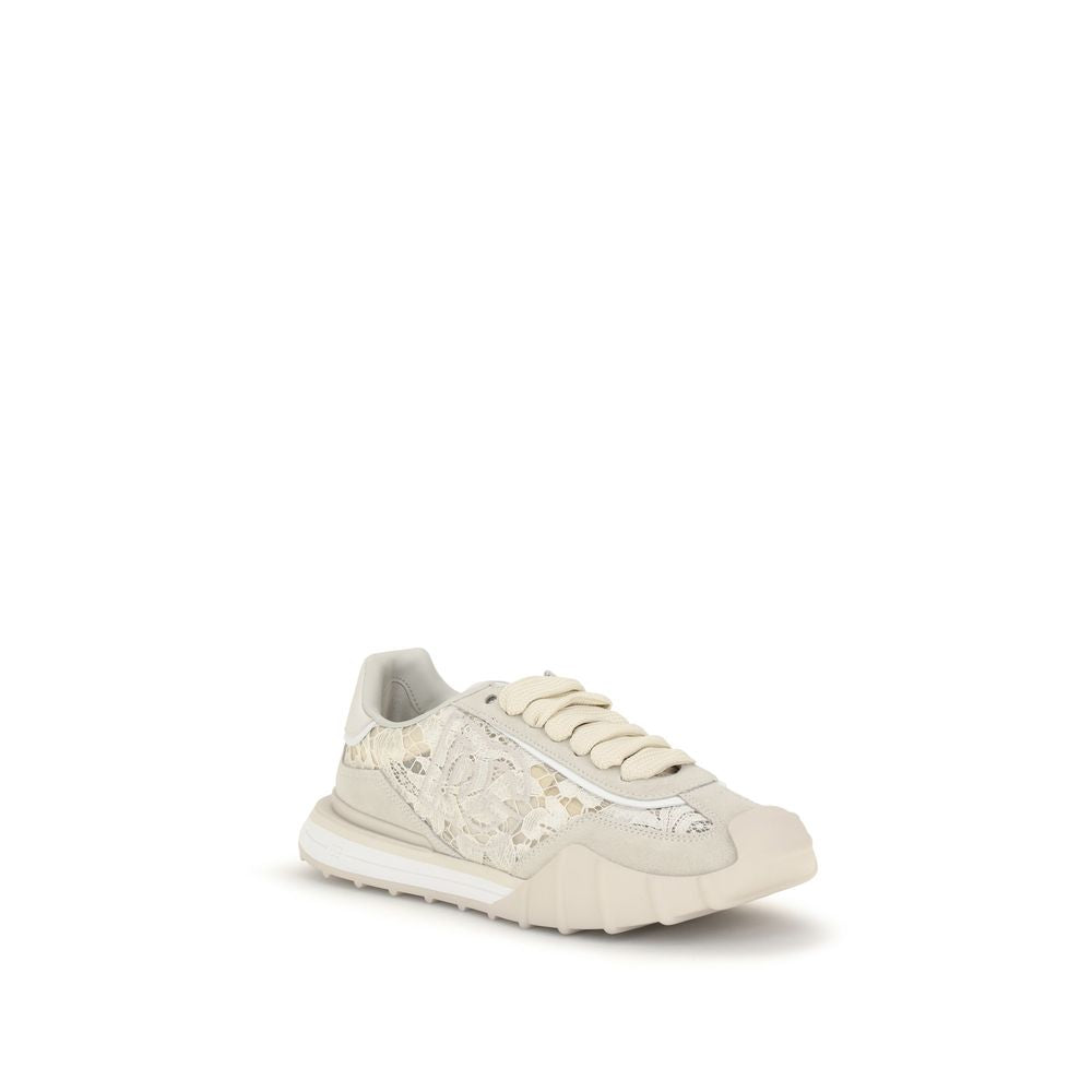 White sneaker with decorative elements on a white background