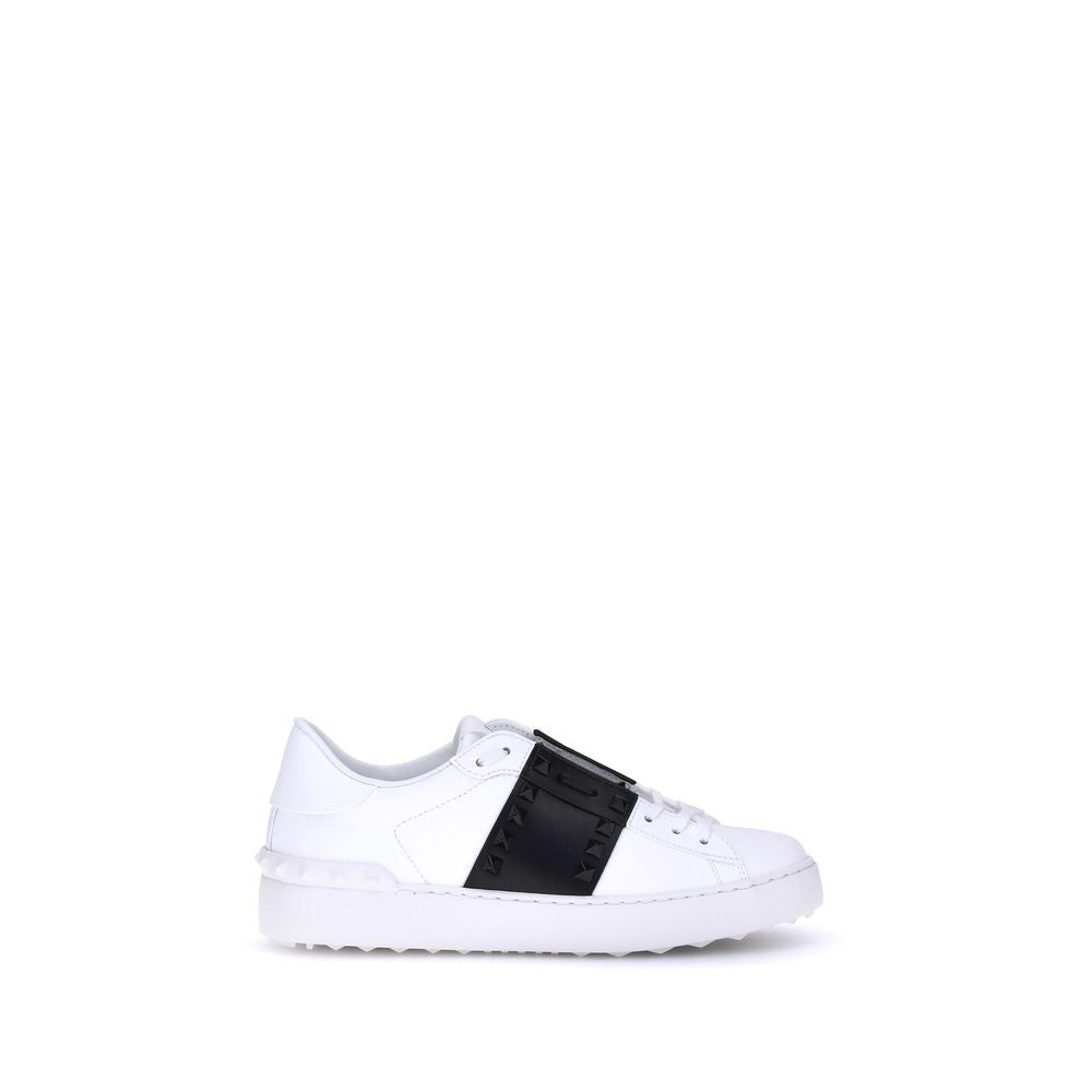 White sneaker with a black stripe on a white background