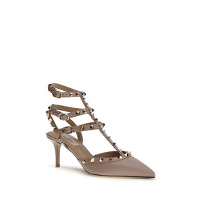 High-heeled shoe with studded design on a white background