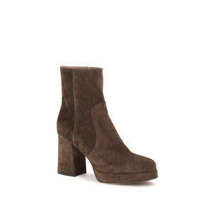 Brown suede ankle boot on a white background