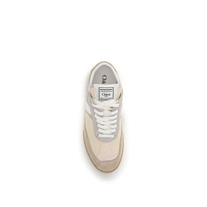 Beige sneaker with white laces on a white background
