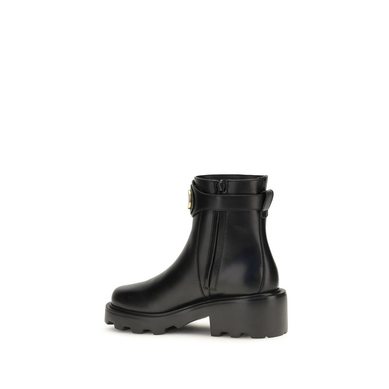 Black ankle boot on a white background