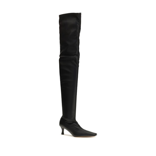 Black knee-high boot on a white background