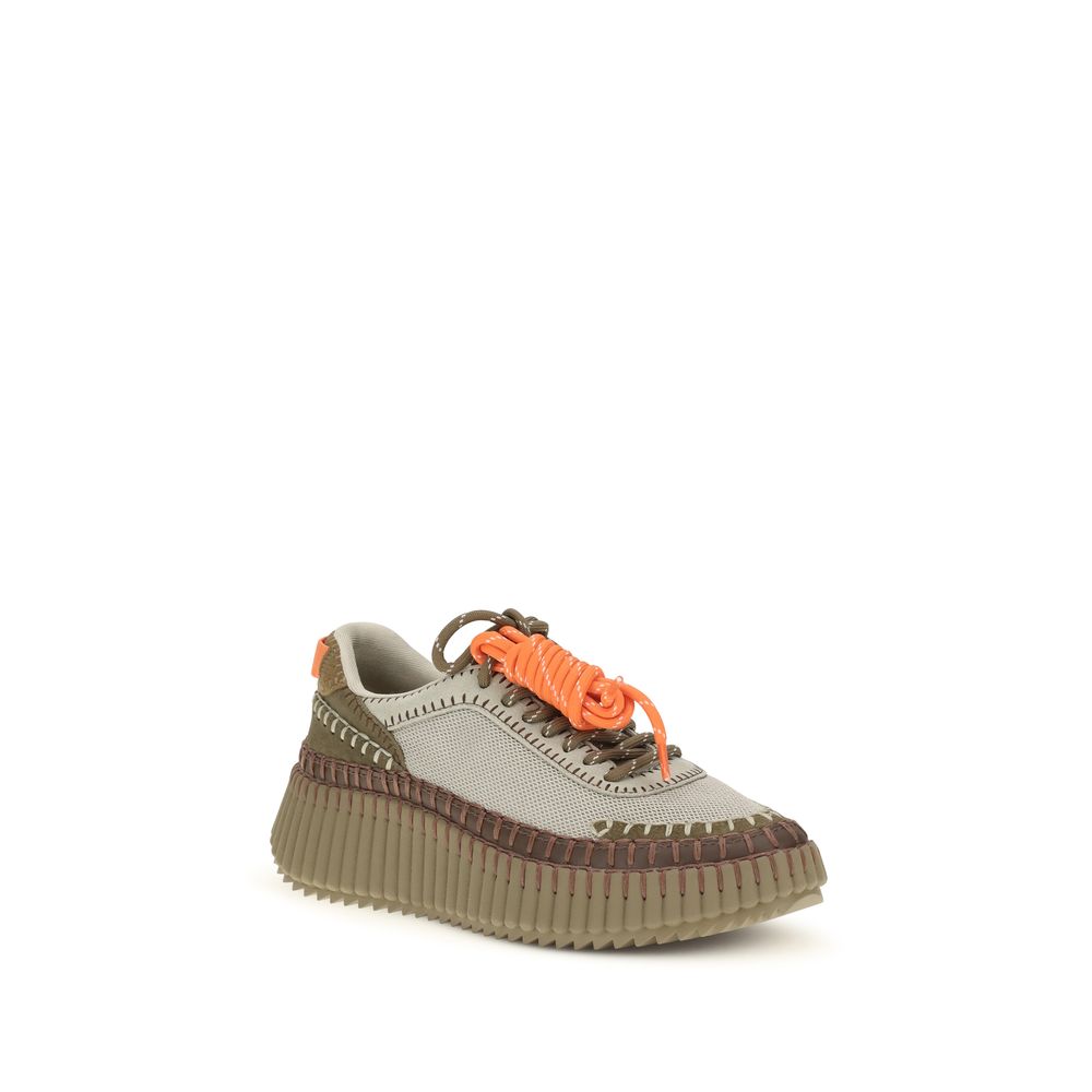 Sole shoe with orange laces on a white background