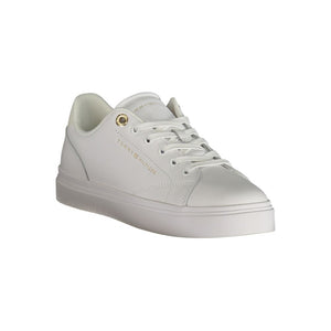 White Tommy Hilfiger polyurethane sneakers for women, featuring a classic low-top design with gold logo detailing.