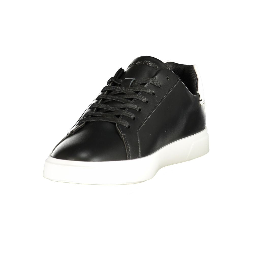 Calvin Klein women's black polyurethane sneaker with a sleek minimalist design and thick white rubber sole.