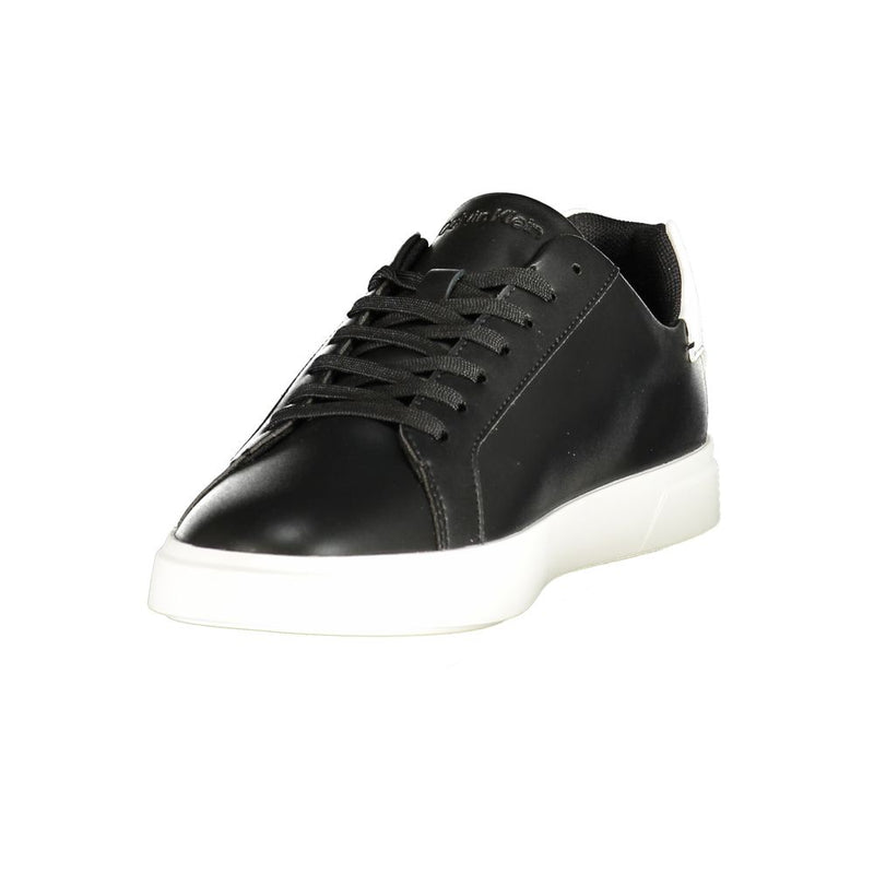 Calvin Klein women's black polyurethane sneaker with a sleek minimalist design and thick white rubber sole.