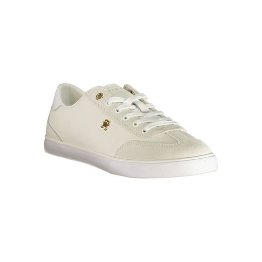 Tommy Hilfiger women’s white polyurethane sneaker with a casual low-top style and gold logo accents.