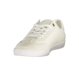 Tommy Hilfiger white polyurethane and suede lace-up sneaker for women with gold-tone accents.