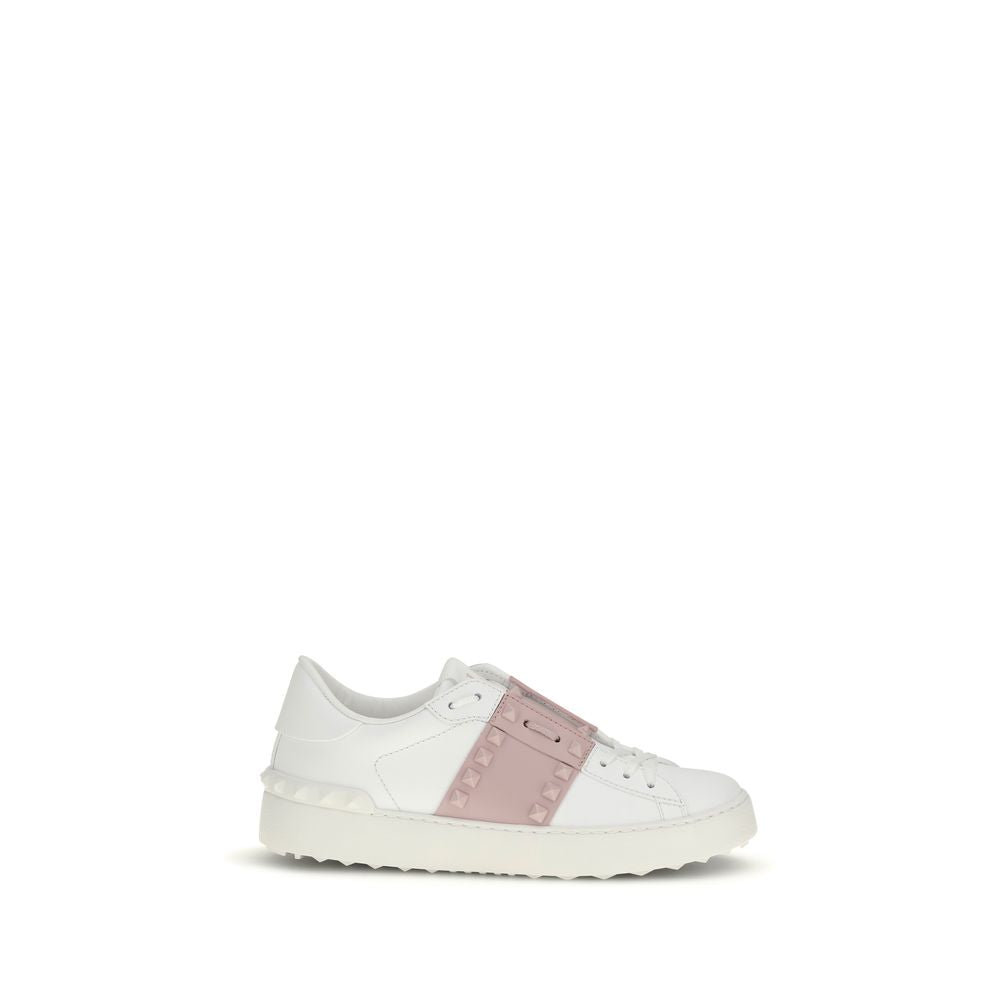 White sneaker with pink accents on a white background