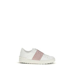 White sneaker with pink accents on a white background