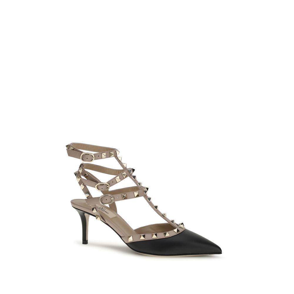Valentino Garavani black calf leather pumps with beige buckled straps and gold-tone Rockstud accents, kitten heel.