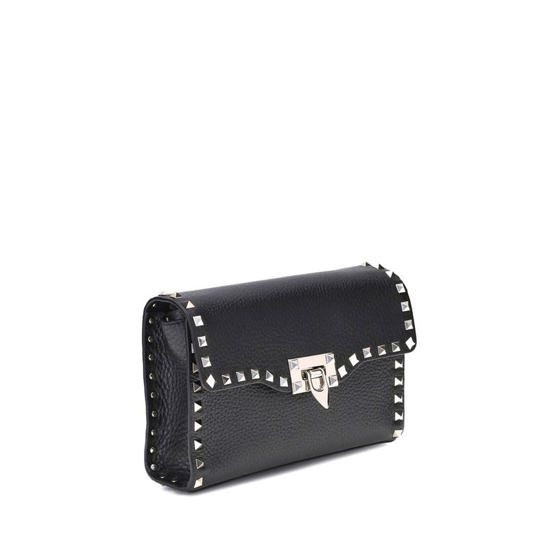 Black textured leather shoulder bag with silver stud trim and clasp closure