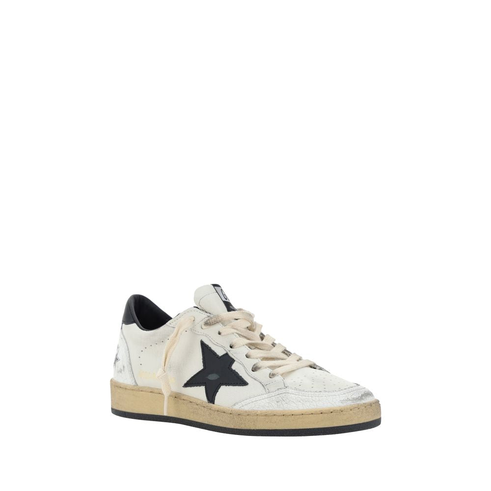 Distressed white leather sneaker with a black star logo, cream laces, and a vintage-look beige rubber sole.