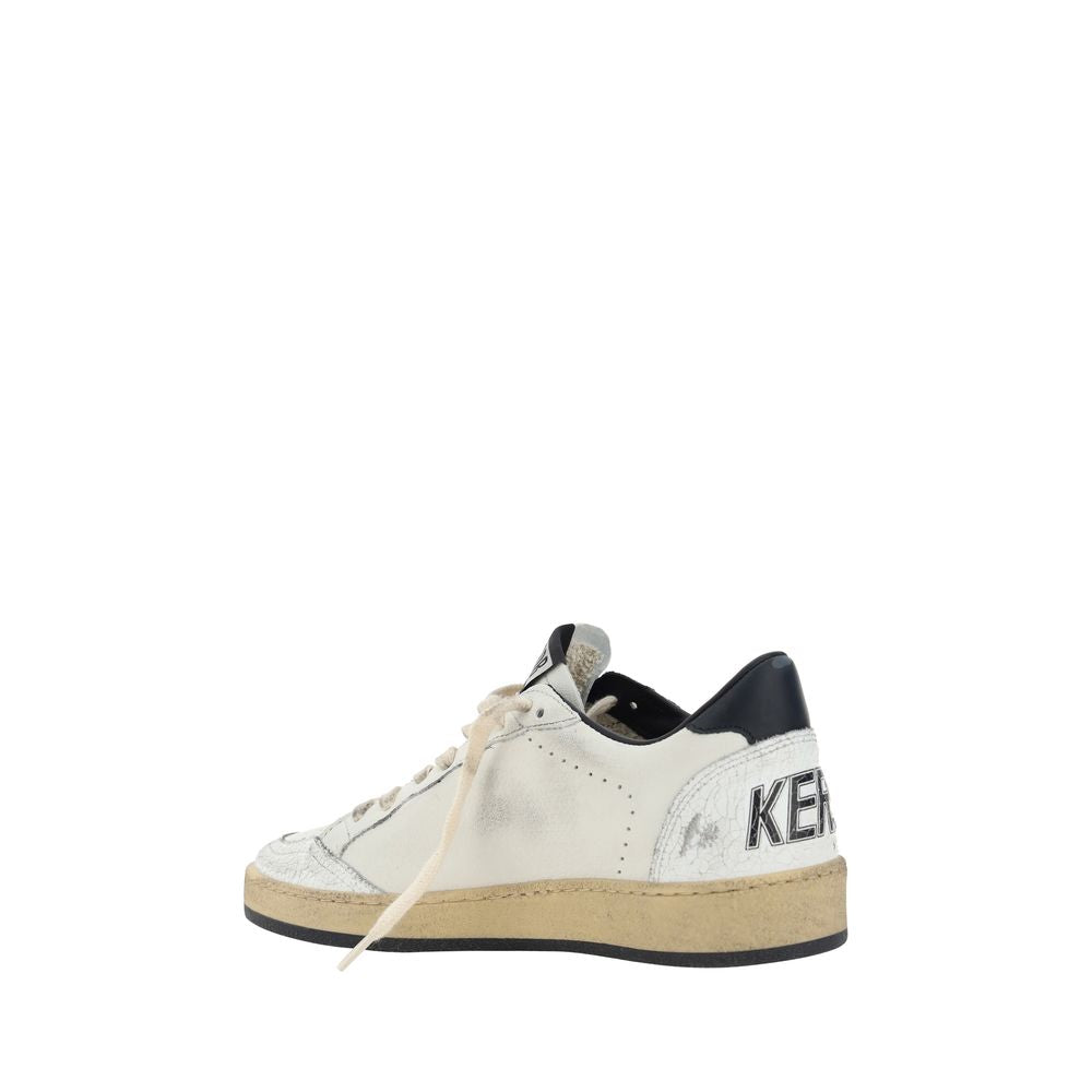 White distressed leather sneaker with tan sole and black heel accent, showing "KEN" text on the side.