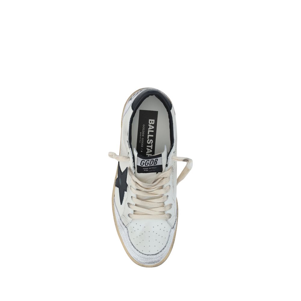White Golden Goose Ball Star sneaker with black star, distressed leather finish, and off-white laces.