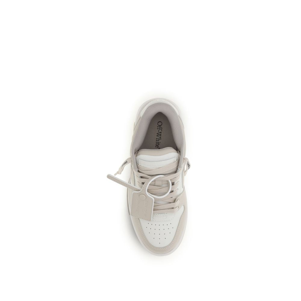 Top-down view of an Off-White sneaker in cream and white leather with a signature zip tie tag.