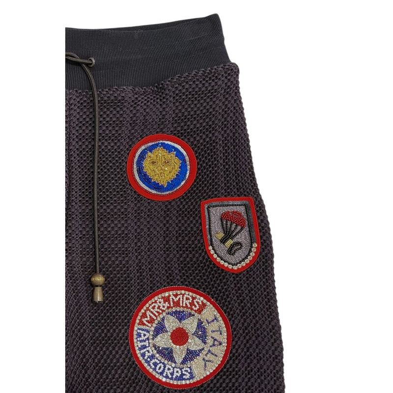 Dark blue knit women pants with embroidered patches and drawstring waist