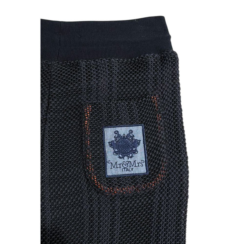 Dark blue knit women pants with a logo patch on the back pocket