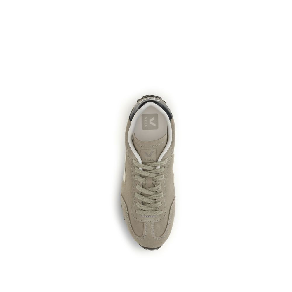 Top-down view of a taupe suede Veja sneaker with matching laces and a contrasting dark navy heel tab.