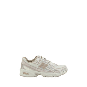 New Balance 740 sneaker in a cream and beige mesh and synthetic colorway with an ABZORB midsole.