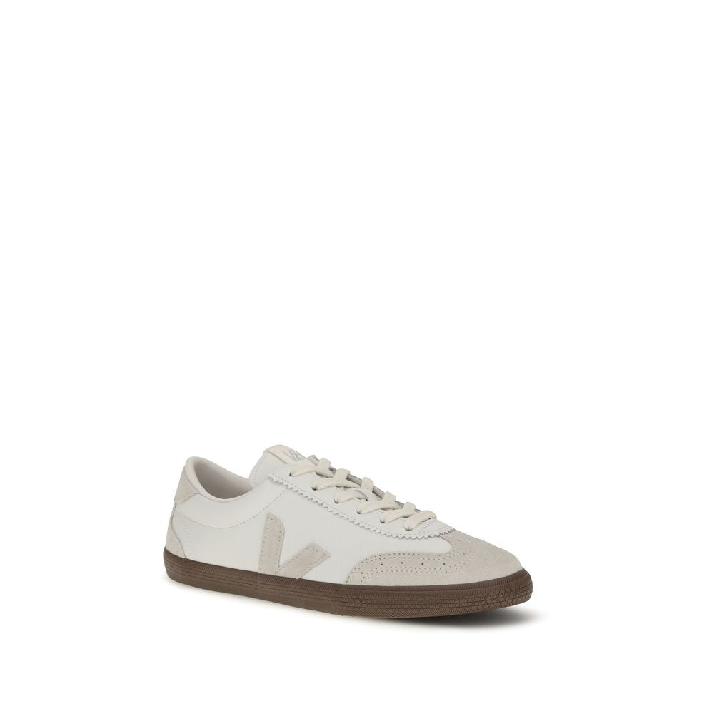 Veja white leather sneaker with beige suede toe cap, signature V logo, and brown gum rubber sole.