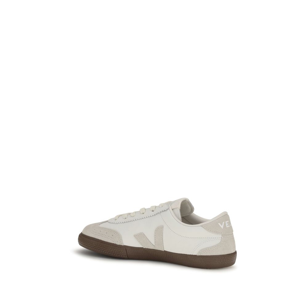 Veja white leather low-top sneaker with grey suede accents and a dark brown gum rubber sole.