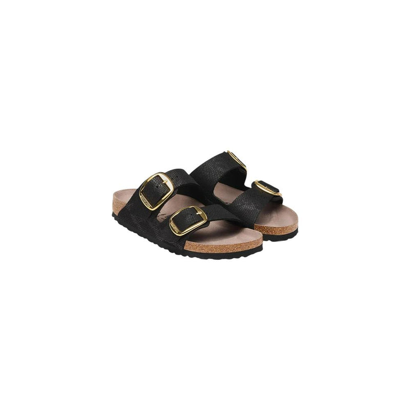 Black textured two-strap Birkenstock-style sandals with gold buckles and cork footbeds on a white background.
