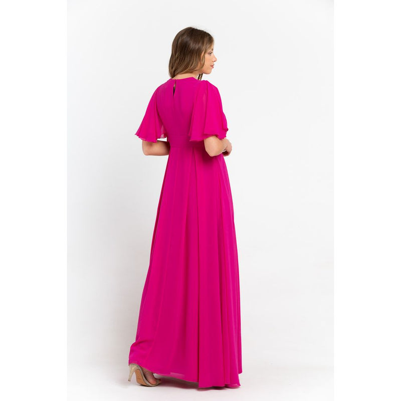 A full-length pink polyester evening dress with flutter sleeves and a keyhole back closure worn by a woman