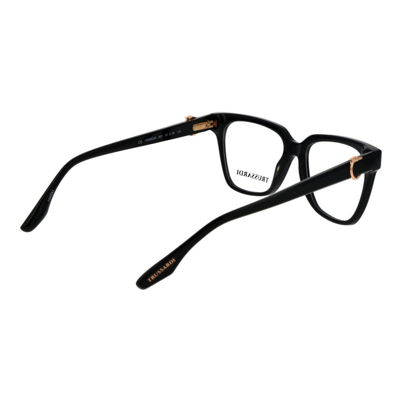 Glossy black acetate glasses frames with bold rectangular rims and gold accents on the temples