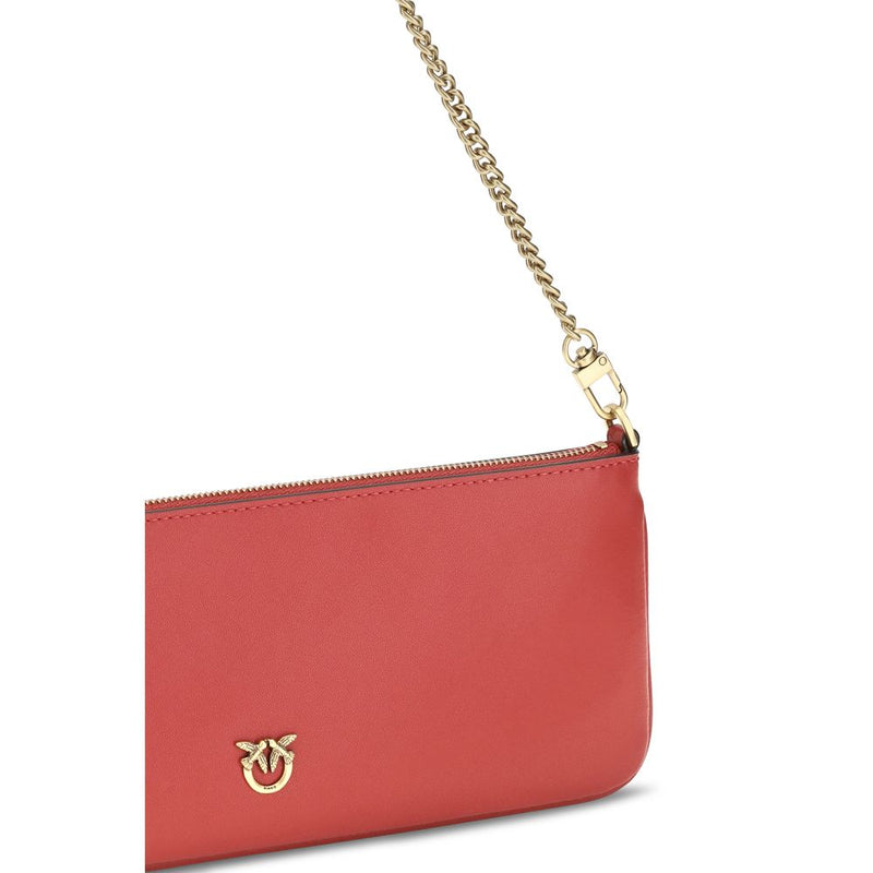Red leather shoulder bag with a gold chain strap and gold hardware