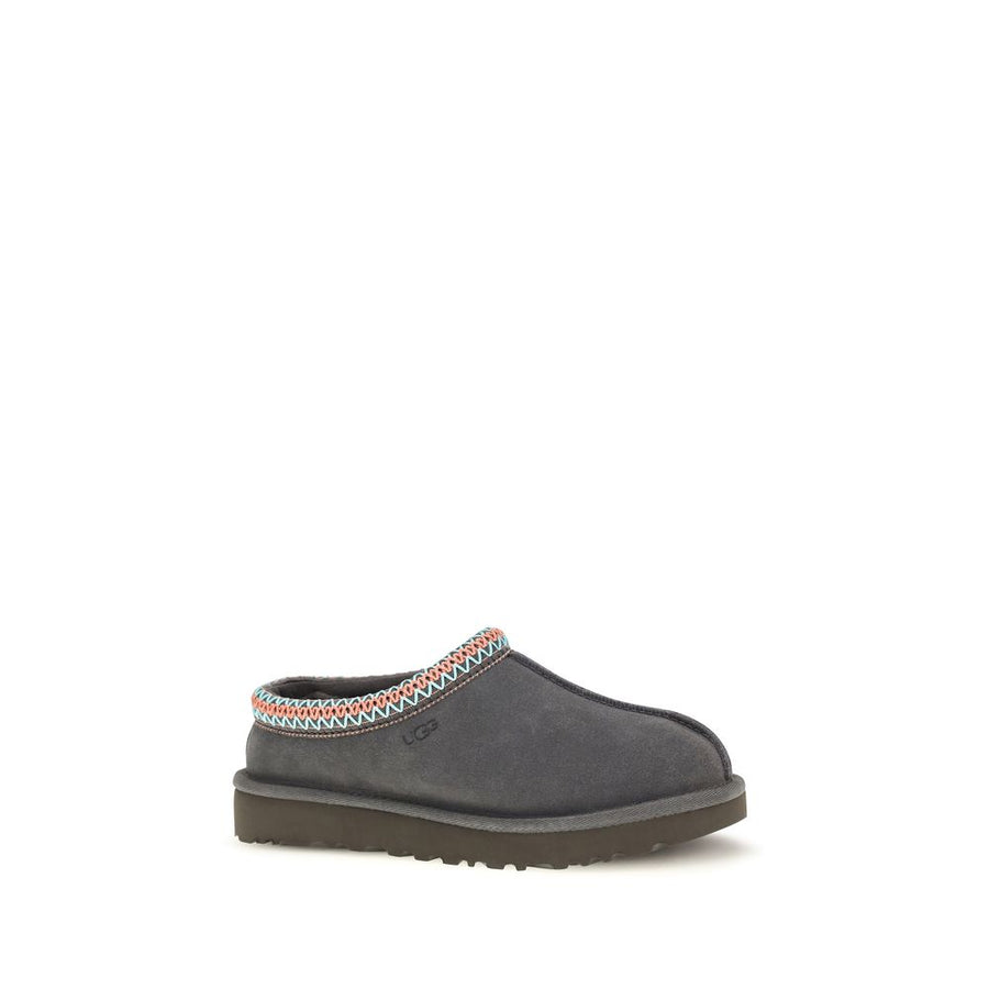 Gray suede mule with colorful embroidered collar and flat sole