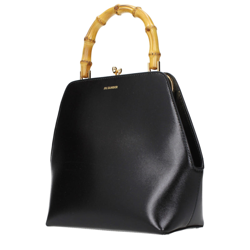 Black leather handbag with a structured frame and curved bamboo top handle
