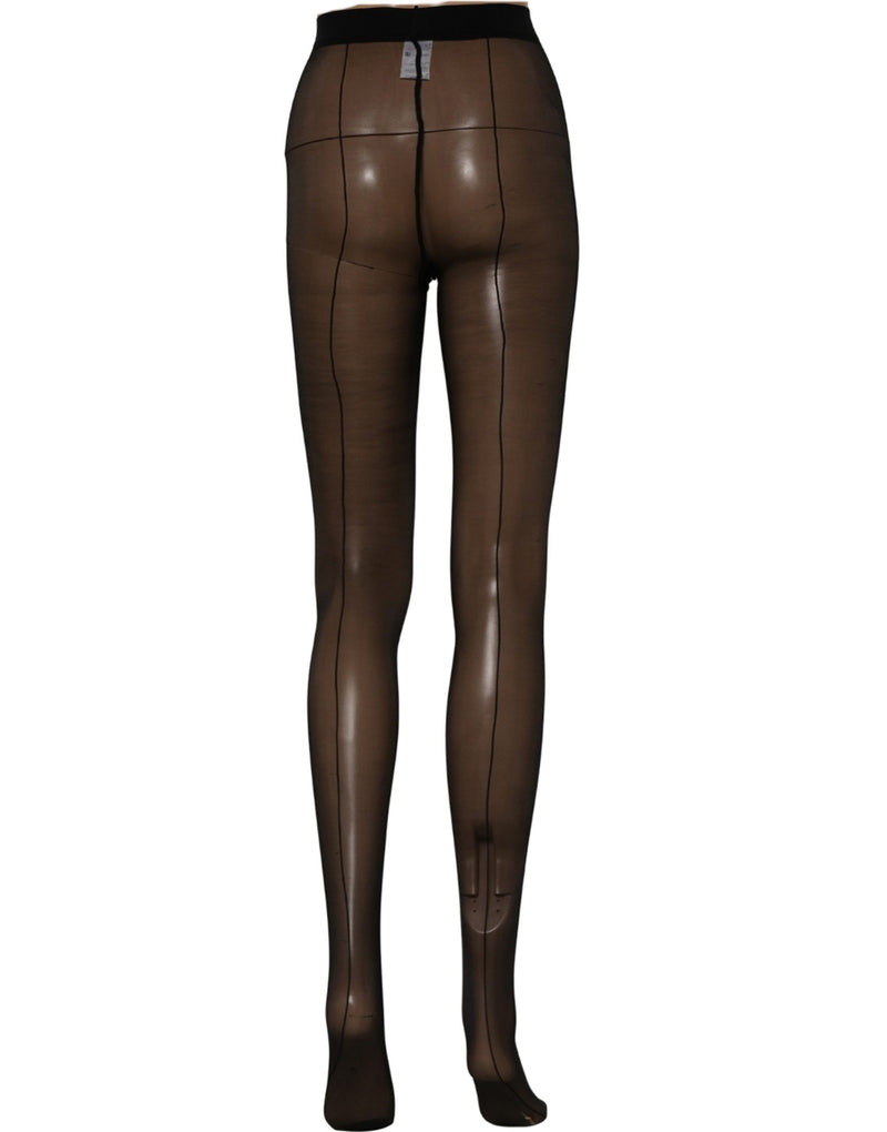 Sheer black nylon tights with back seams worn on a mannequin