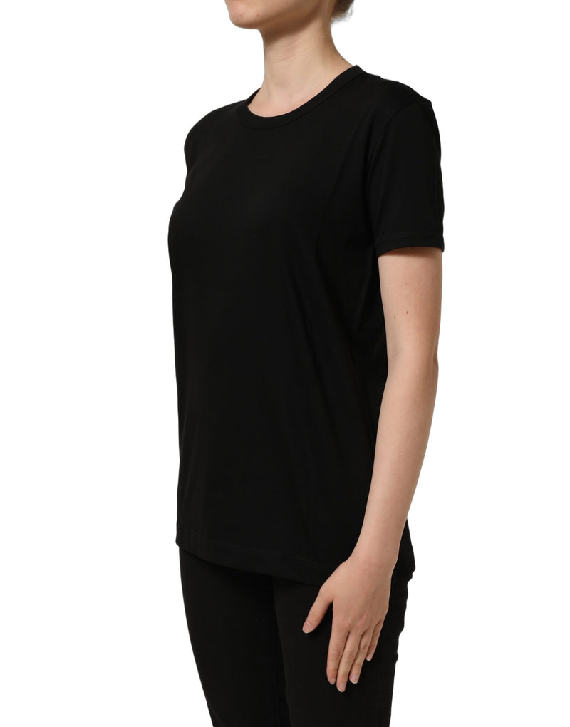 Black cotton short-sleeve crew neck t-shirt worn by a model