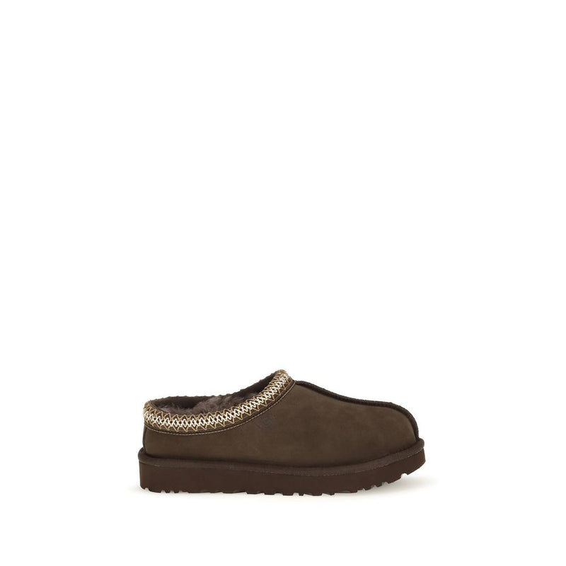 Brown suede slip-on mule with plush lining and patterned trim