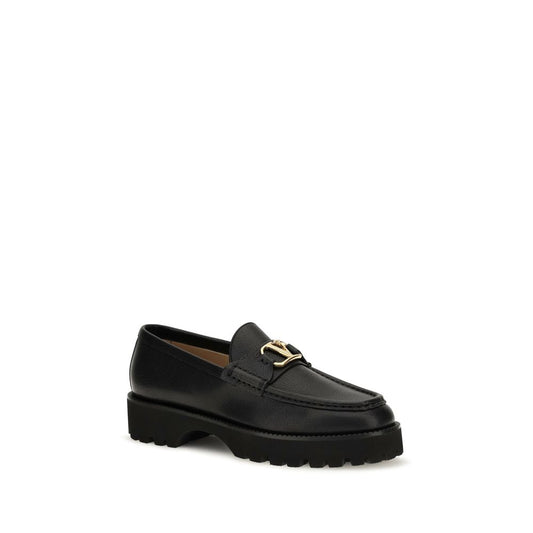 Black goatskin leather platform loafer with a thick lug sole and gold V logo hardware