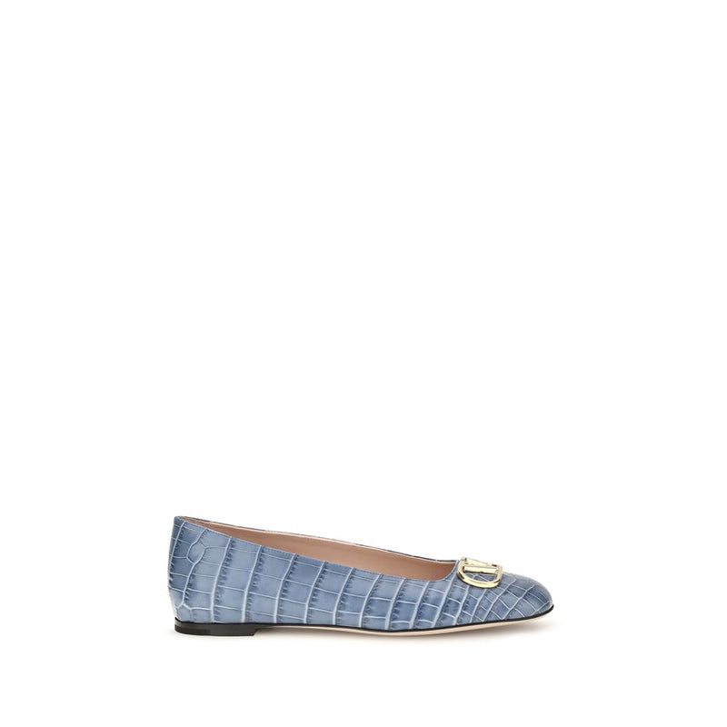 Blue embossed leather ballet flats with a gold-tone logo buckle