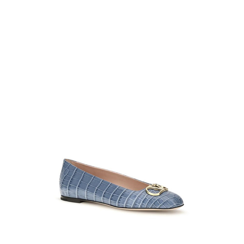 Blue embossed leather ballet flat with a gold logo on the toe
