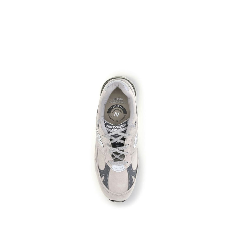 Gray suede and mesh New Balance athletic sneaker viewed from above
