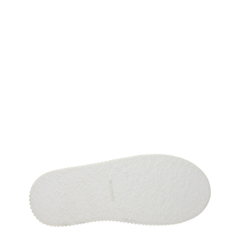 White leather platform sneaker sole with textured bottom and debossed logo