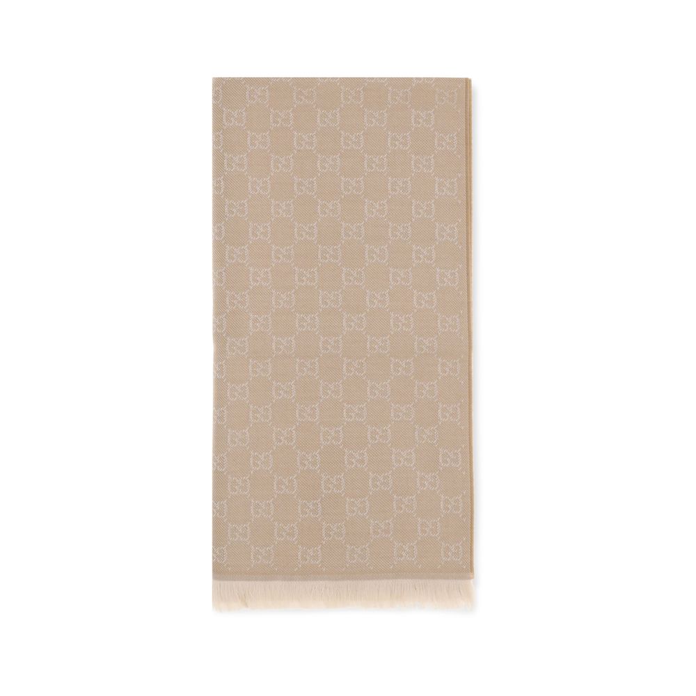 Gucci beige wool scarf with allover GG monogram pattern and fringed hem.