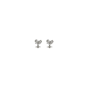 Vivienne Westwood silver stud earrings shaped like textured bows.