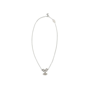 Vivienne Westwood silver-tone metal necklace featuring a crystal-embellished bow and orb pendant on a delicate chain.